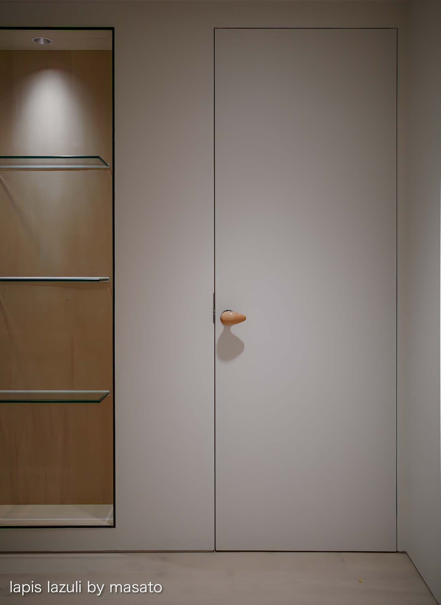 神戸・東灘のマンションリノベーション、メープルの取っ手だけが見える隠し蝶番のトイレ扉